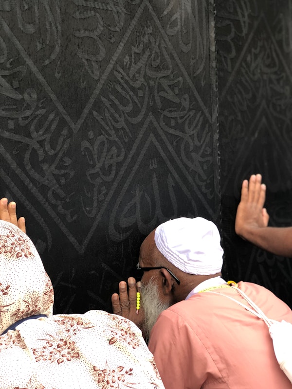 Muslim praying in mosque